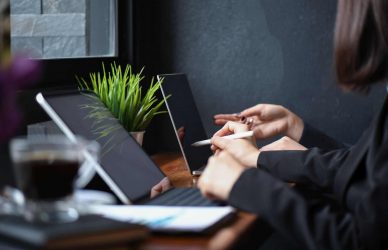 business-girl-team-working-with-laptop-in-office-J6ZQFNR.jpg